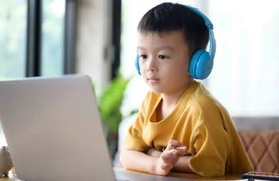 Middle school student studying at desk